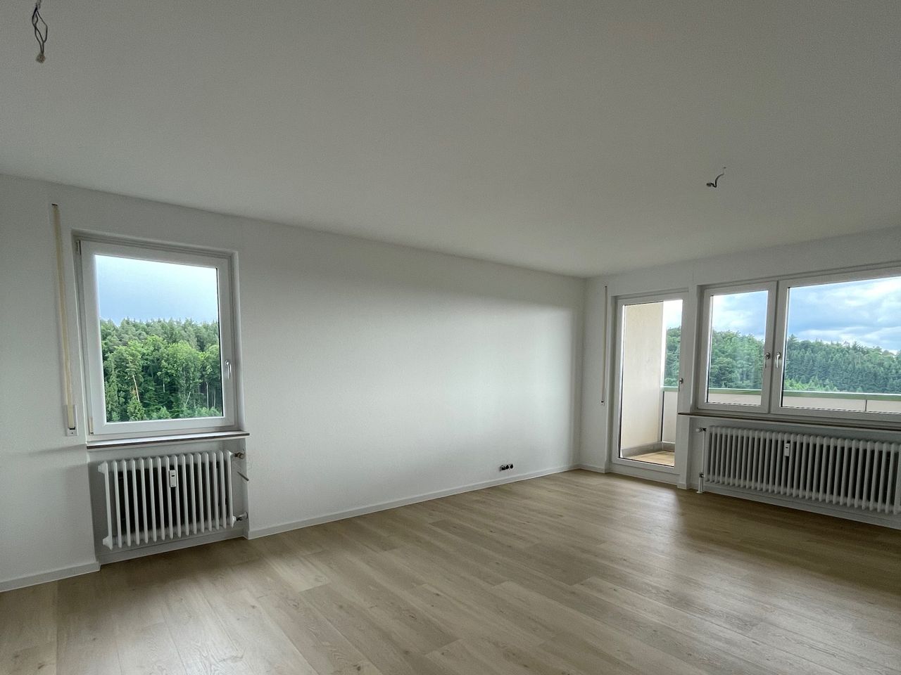 Wohnzimmer mit Zugang zur Loggia